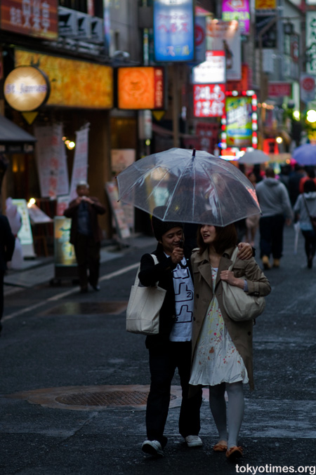 Japanese people in the rain