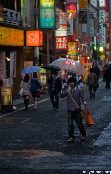 Japanese people in the rain