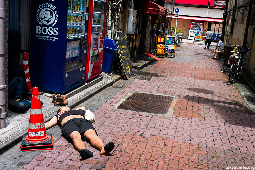 drunk and sleeping in Tokyo