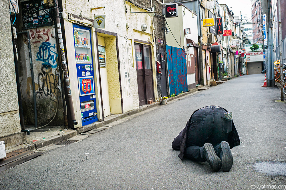 drunk and asleep in Tokyo