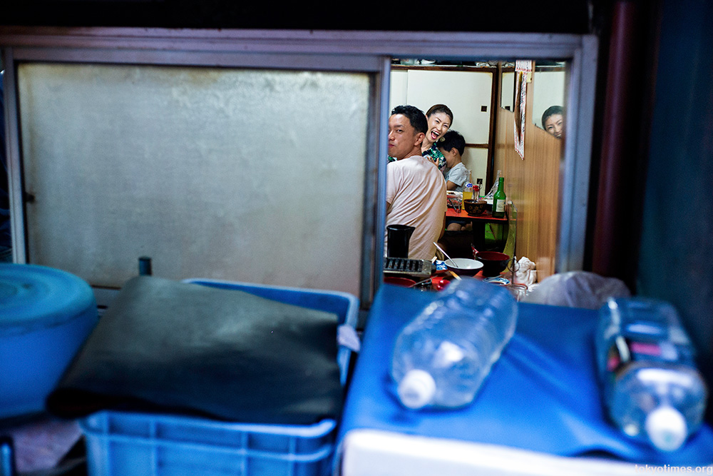 Tokyo restaurant smile and reflections