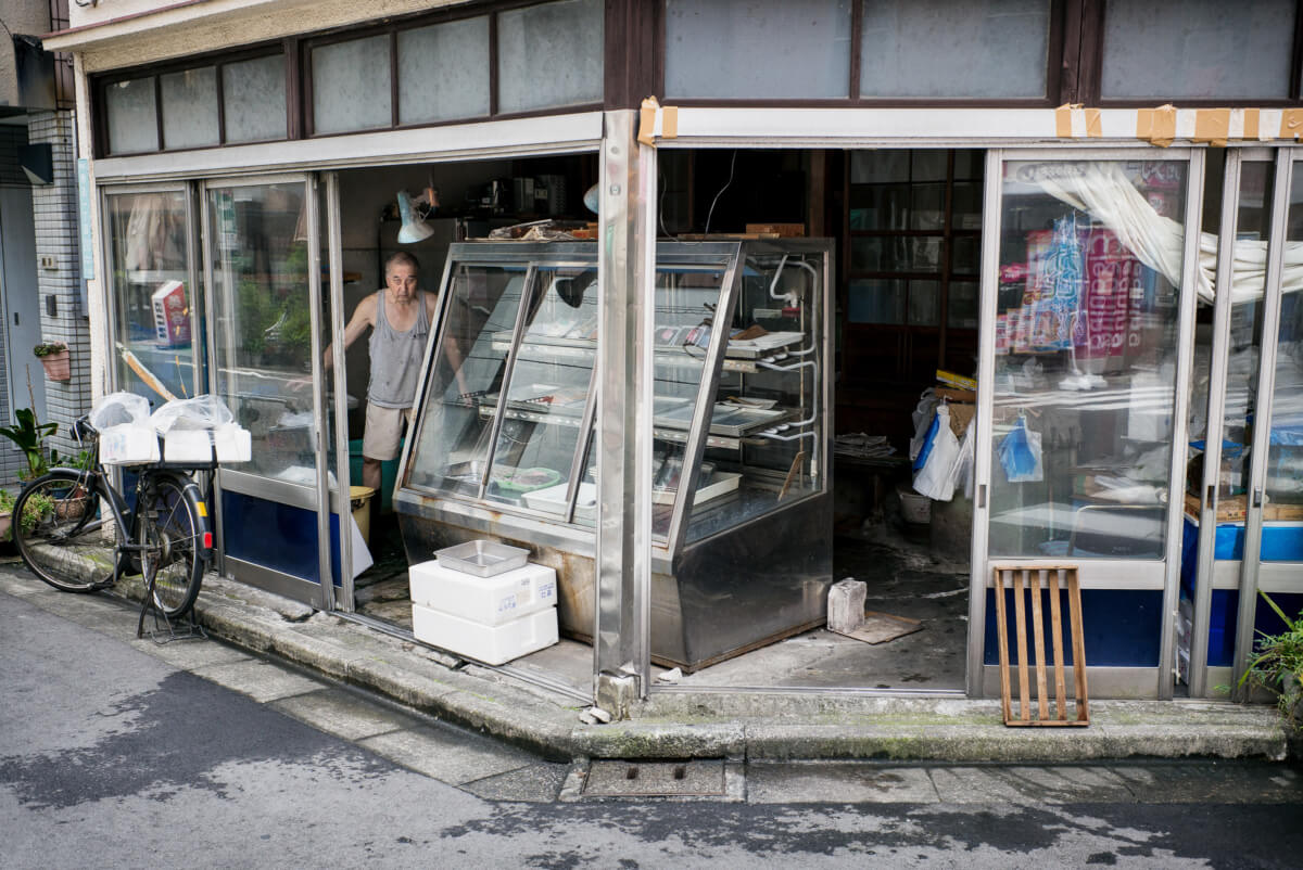old fashioned Tokyo fish shop stares