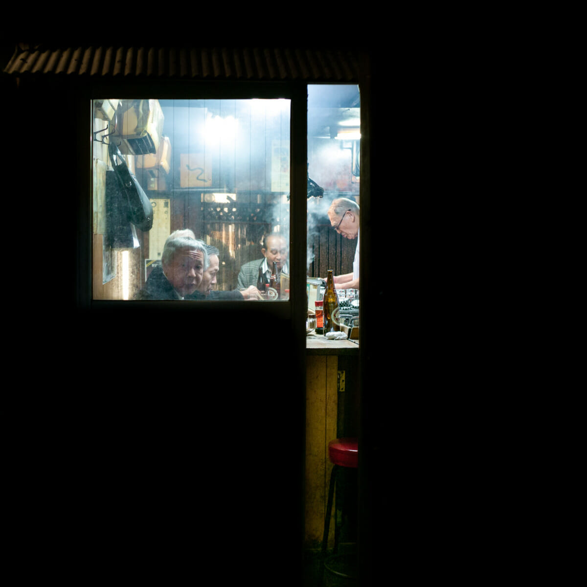 an atmospheric and smoky little tokyo bar