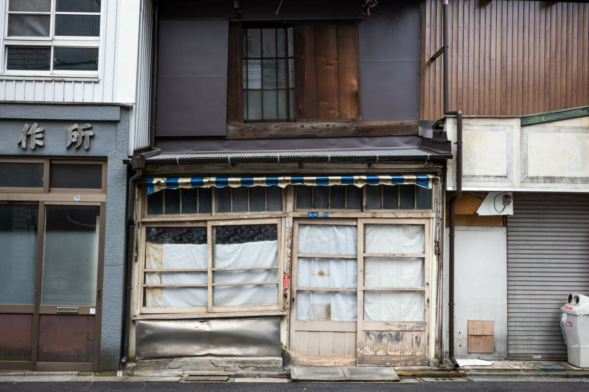 a crooked and askew old Tokyo tofu shop
