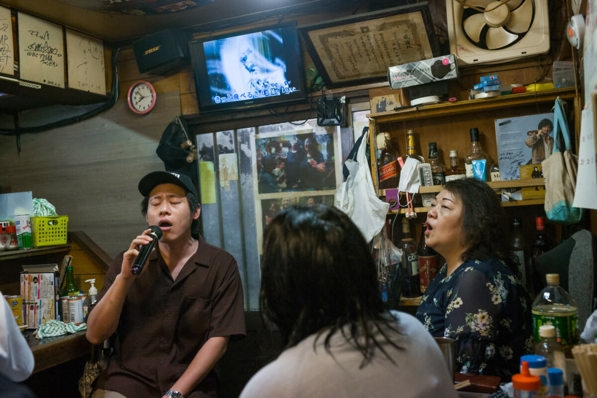 singing in a cluttered little Tokyo bar