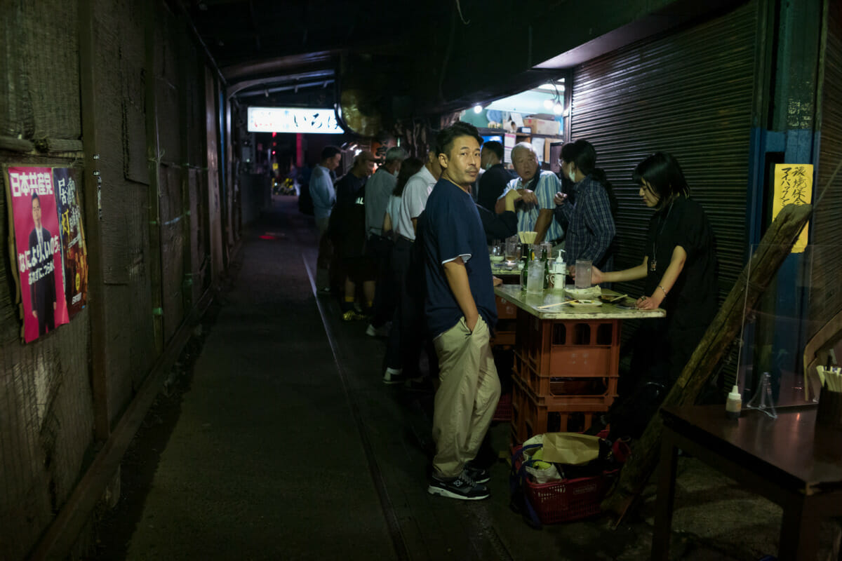 Drinks in a dark and dingy Japanese alleyway