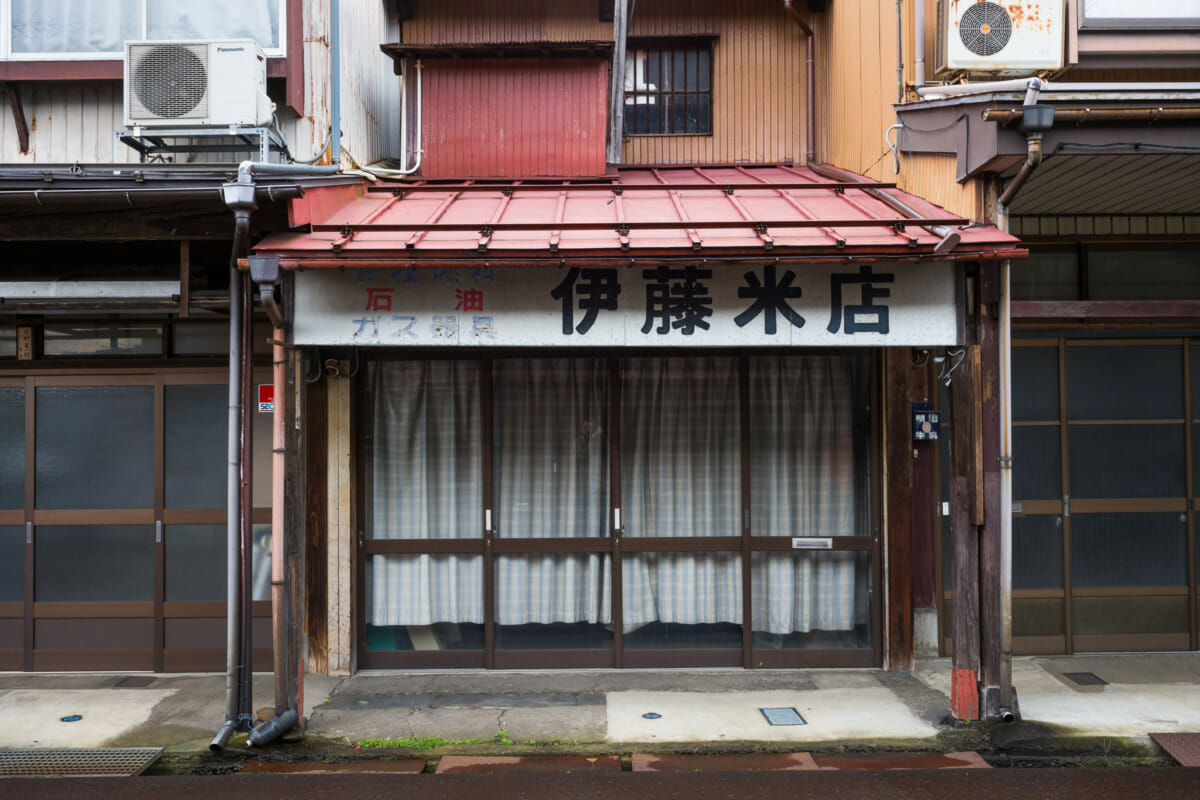 The faded traditional shop fronts of an old Japanese town