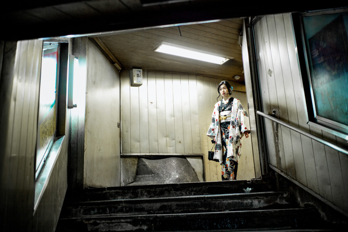 Japanese woman wearing a kimono in the subway