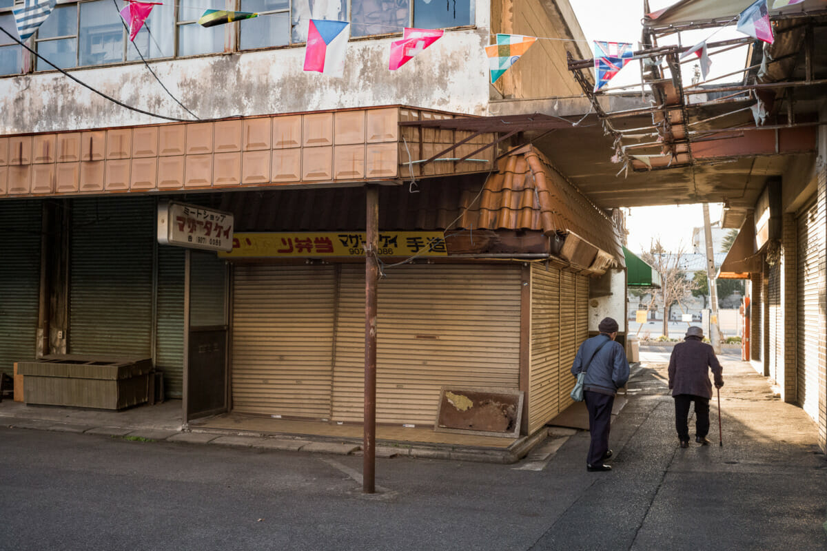 a shuttered Tokyo shopping street