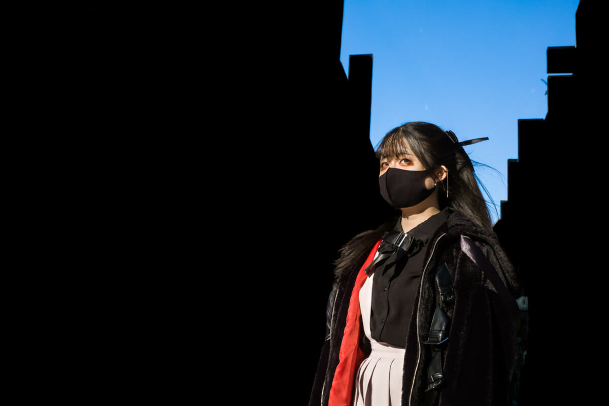 A striking Japanese woman looking into the light