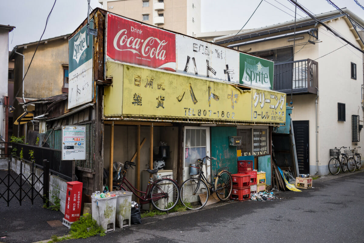 The colours and retro sign of an old Tokyo shop