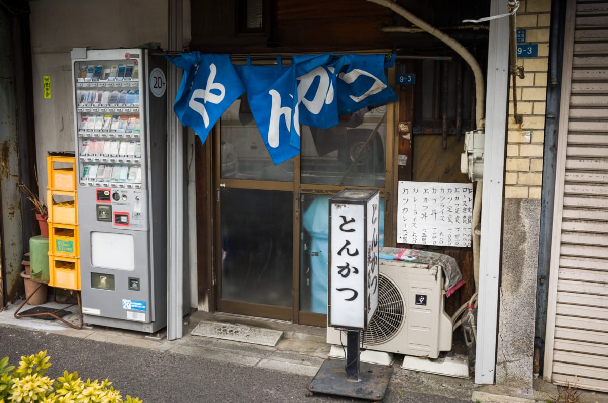 A cluttered and tiny old Tokyo tonkatsu restaurant