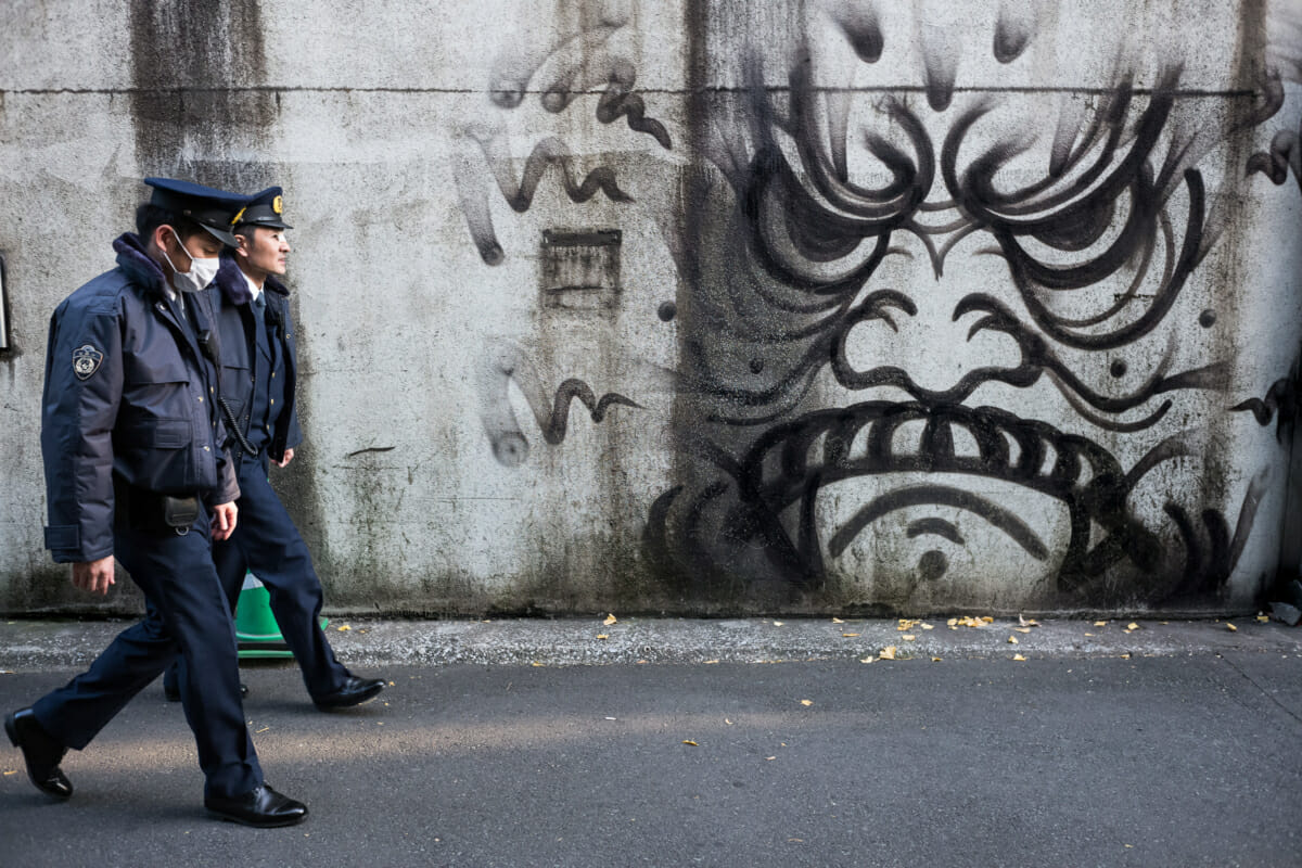 Tokyo police officers versus graffiti